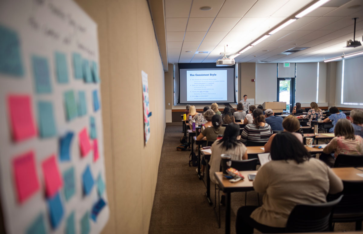 Sticky notes and people at a workshop
